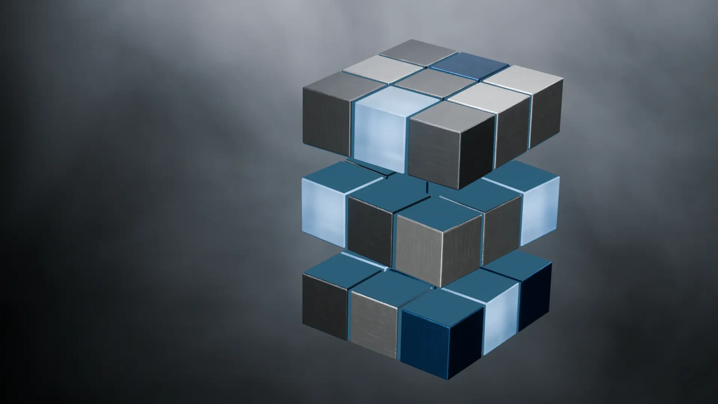 The cube lifted apart into its three layers of brushed metal and frosted glass cubelets